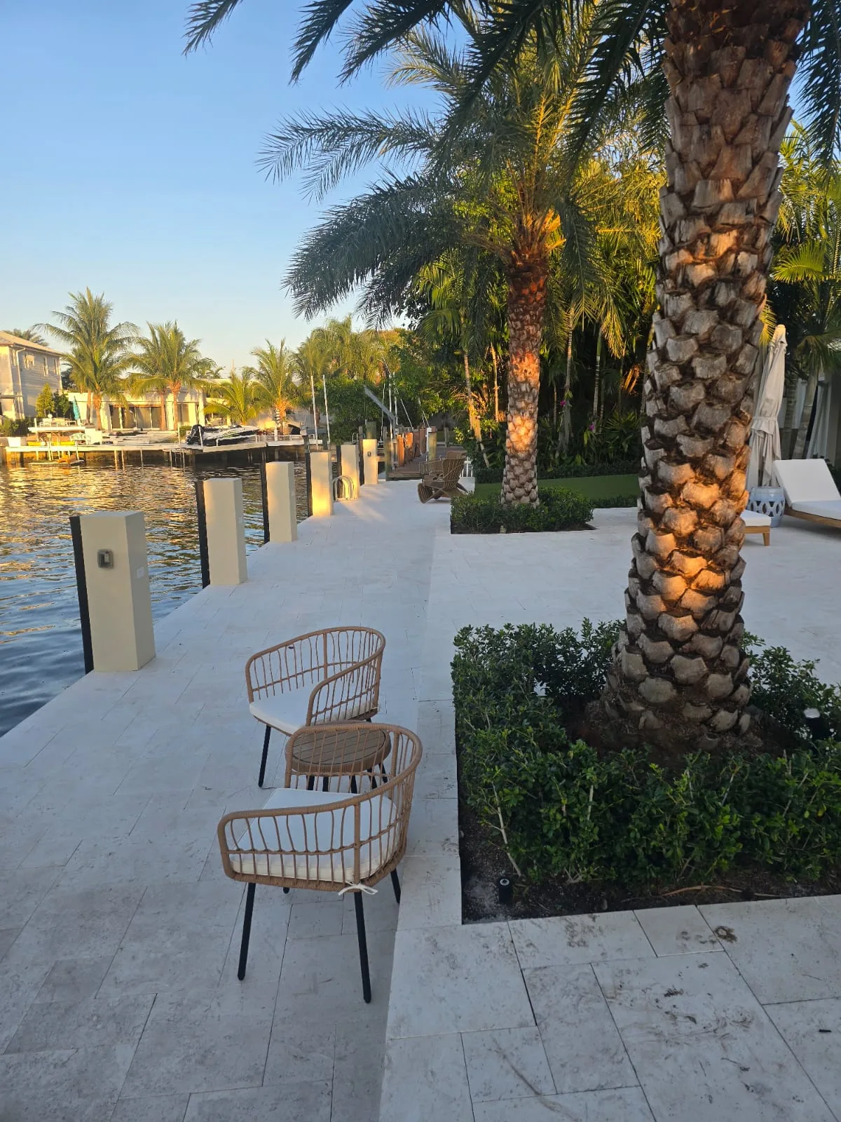 Coastal dockside patio and landscaping along a Pompano Beach canal